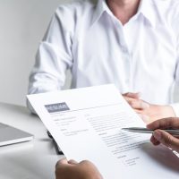 Employer,Arriving,For,A,Job,Interview,,Committee,Listen,To,Candidate